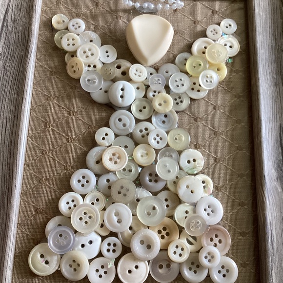 Button angel in frame. Gold fabric background. Wood like frame with gold trim. - Picture 4 of 5